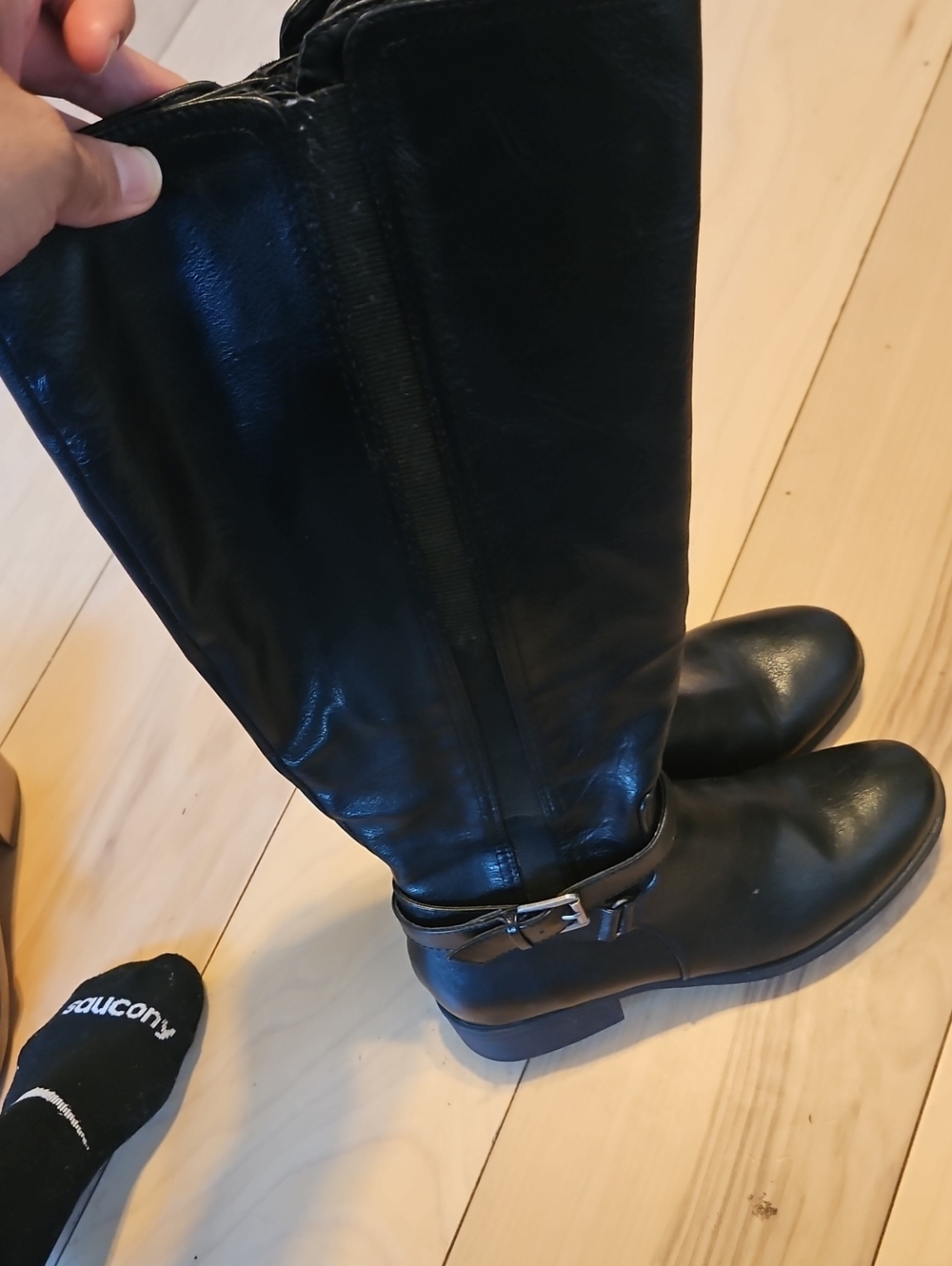 Black Leather Knee-High Riding Boots And Sandals
